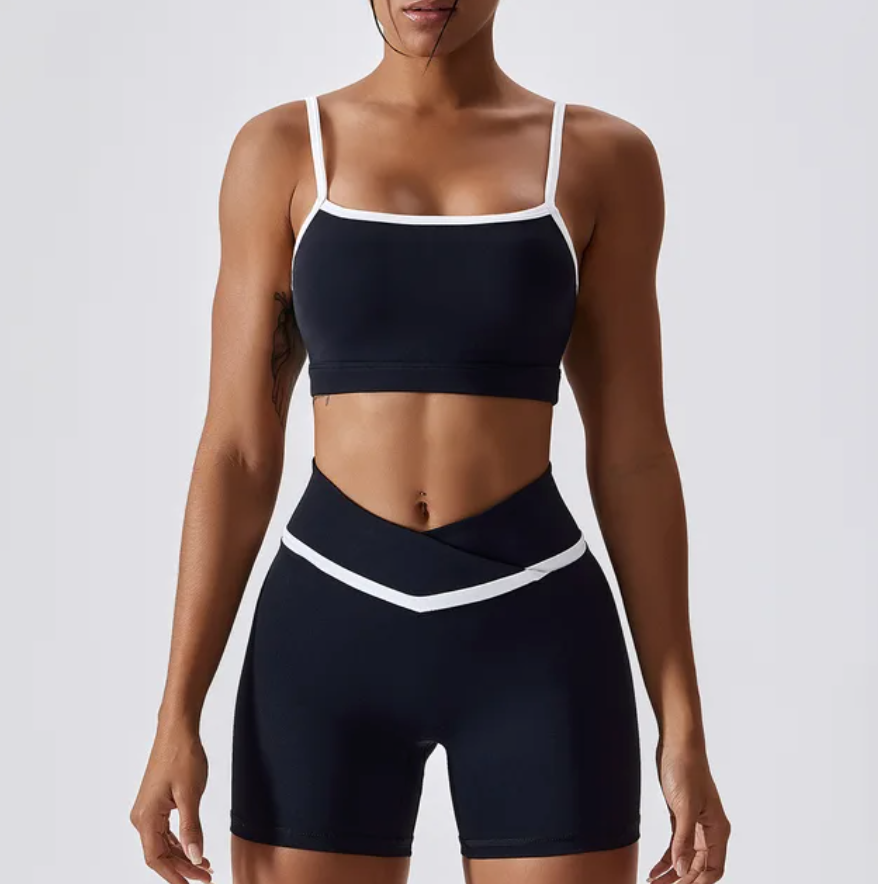 Give your off-duty wardrobe a new lease of life with this monochrome gym crop top and shorts set. This cropped cami top with hidden padding is brought to you in a monochrome grey and white style with white piping straps and a seamless design. This gym fit set is everything you need for your everyday errands, pilates or for your gym session.  Suitable for yoga, exercise, fitness, running, any type of workout, or everyday use. this sportswear set is soft, comfortable and flattering black