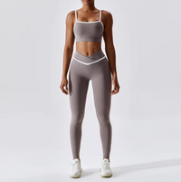 Give your off-duty wardrobe a new lease of life with this monochrome gym crop top and full length leggings set. This cropped cami top with hidden padding is brought to you in a monochrome grey and white style with white piping straps and a seamless design. This gym fit set is everything you need for your everyday errands, pilates or for your gym session. 