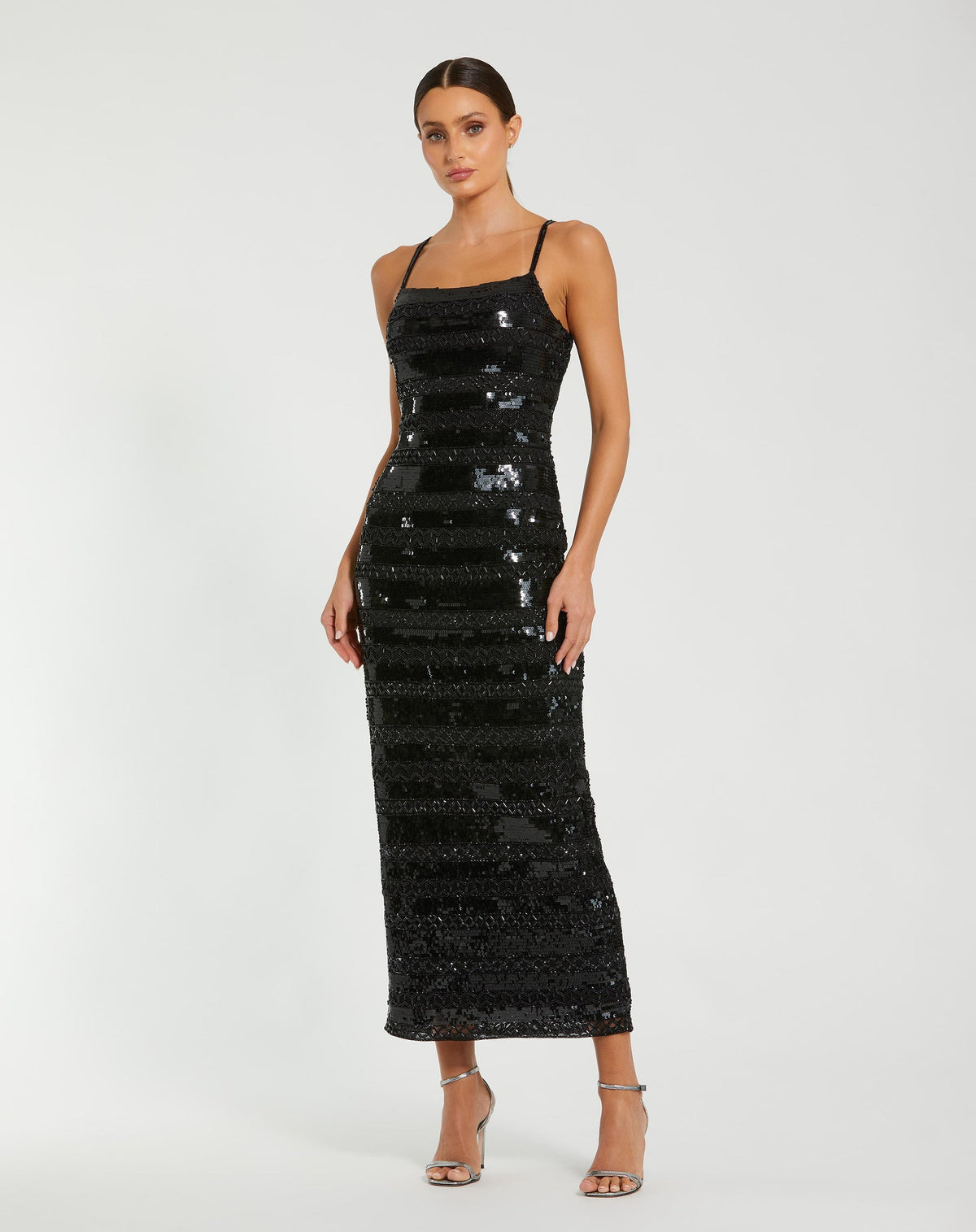 Model wearing Mac Duggal Black Embellished Spaghetti Strap Midi Dress #10094