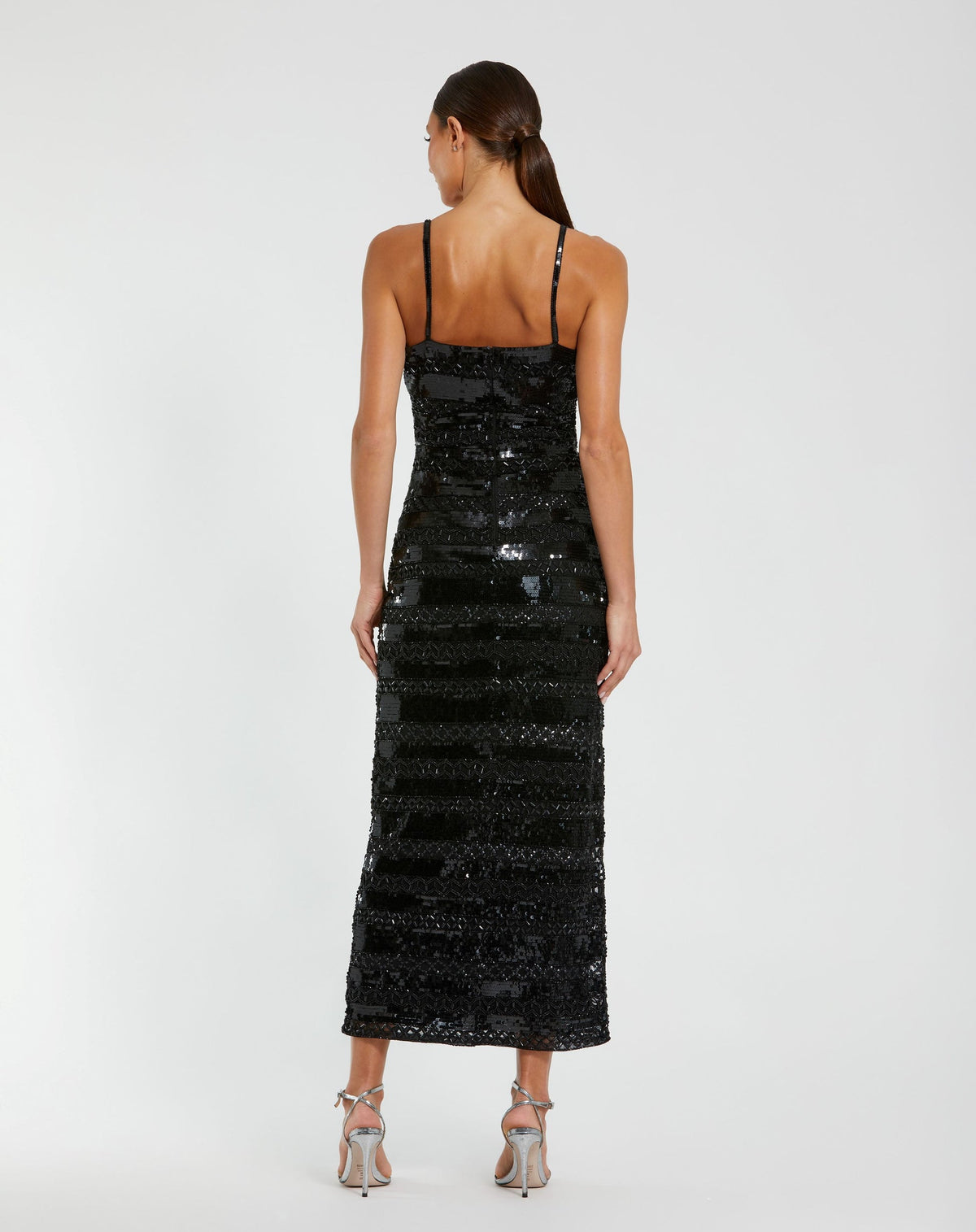 Back view of model wearing Mac Duggal Black Embellished Spaghetti Strap Midi Dress #10094