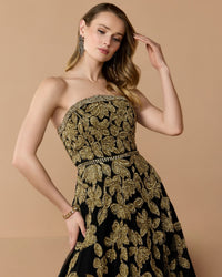 Mac Duggal #10274 black gold gown lifestyle close up