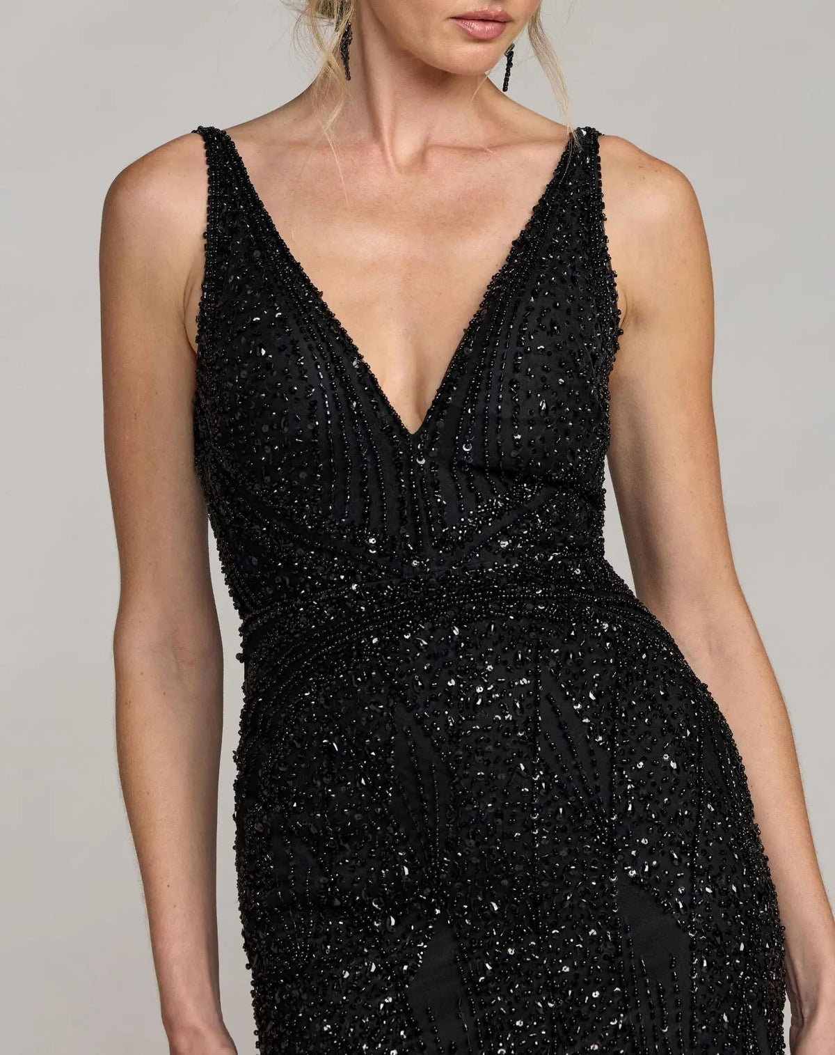Black-plunging-v-neck-tulle-evening-gown-with-allover-beading-front