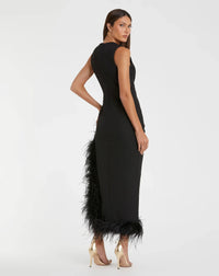 Black evening gown with feather details on a white background