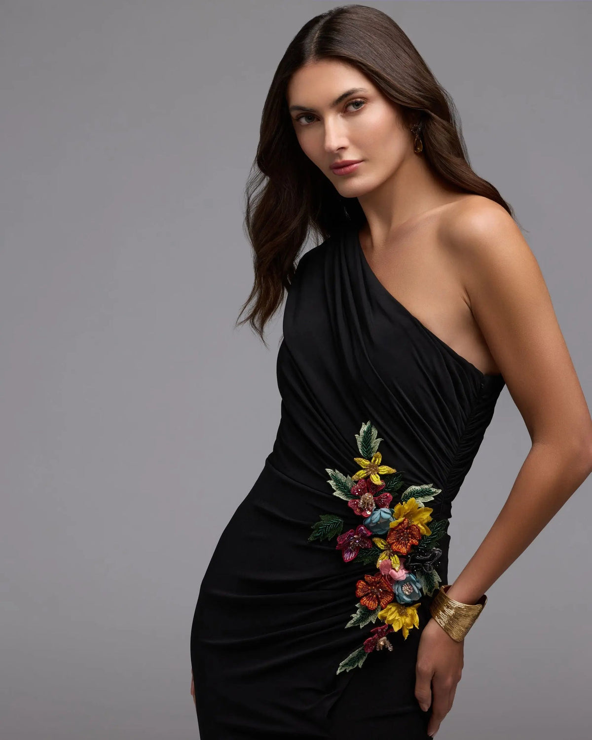 Asymmetrical-black-evening-dress-with-draped-sleeve-and-floral-embroidery