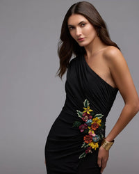 Asymmetrical-black-evening-dress-with-draped-sleeve-and-floral-embroidery