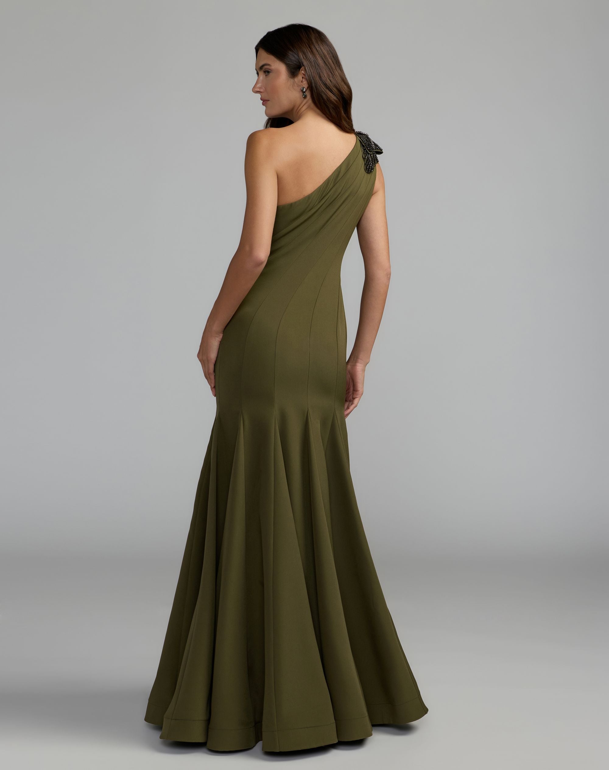 Green Crepe One Shoulder Gown With Crystal Flower