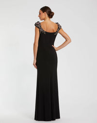 Mac Duggal 11842 Black jersey scoop neck gown with 3D flower details - Back view