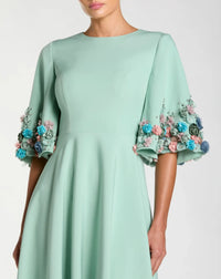 Mac Duggal 11854 Sage stretch satin elbow sleeve gown with flower trim - detail