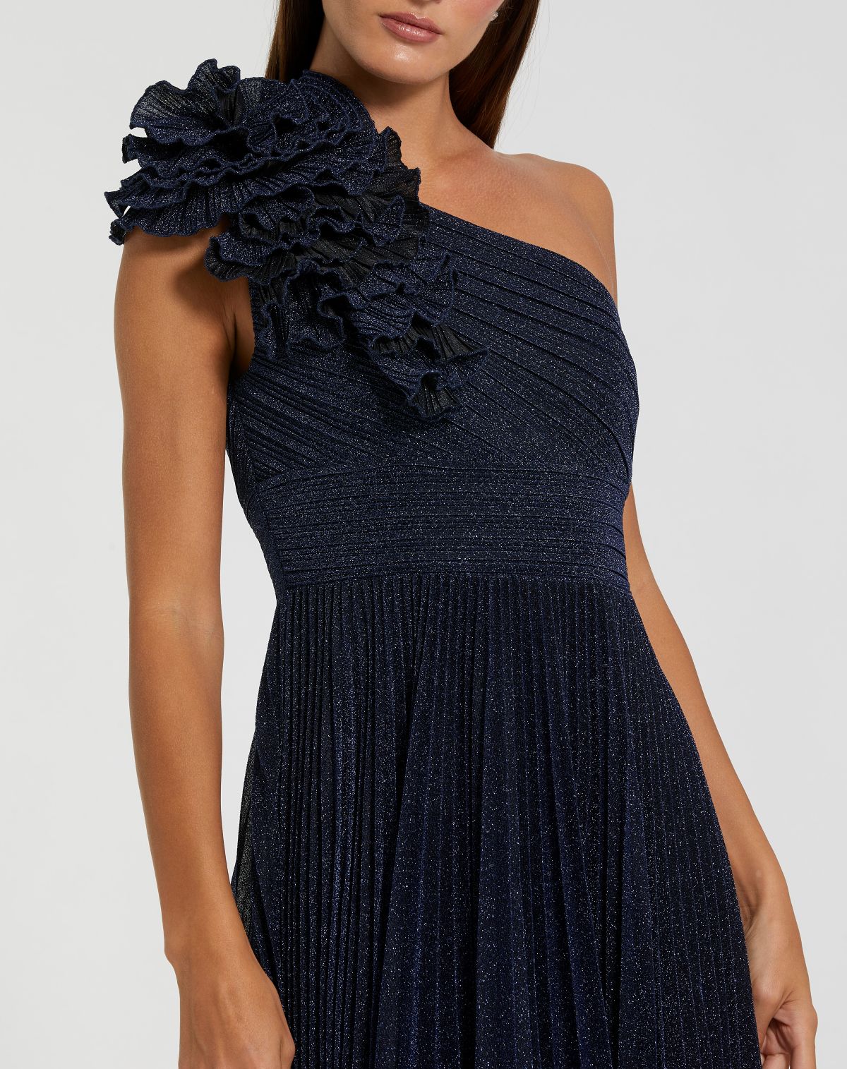 Navy one-shoulder dress with floral detail on a white background
