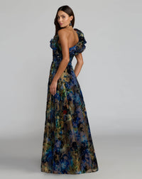 Woman wearing a floral evening gown on a plain background