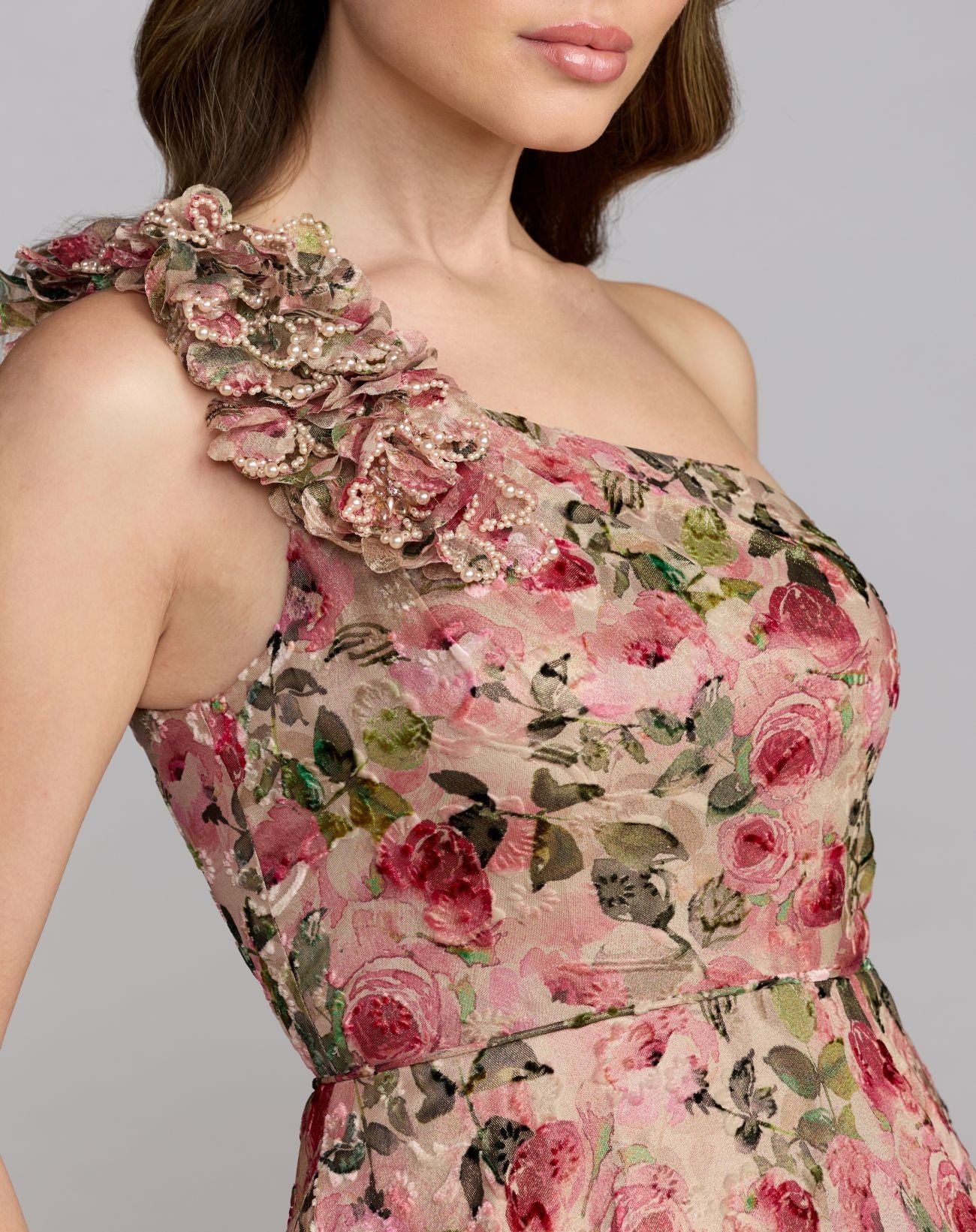 Floral one-shoulder dress with a gray background