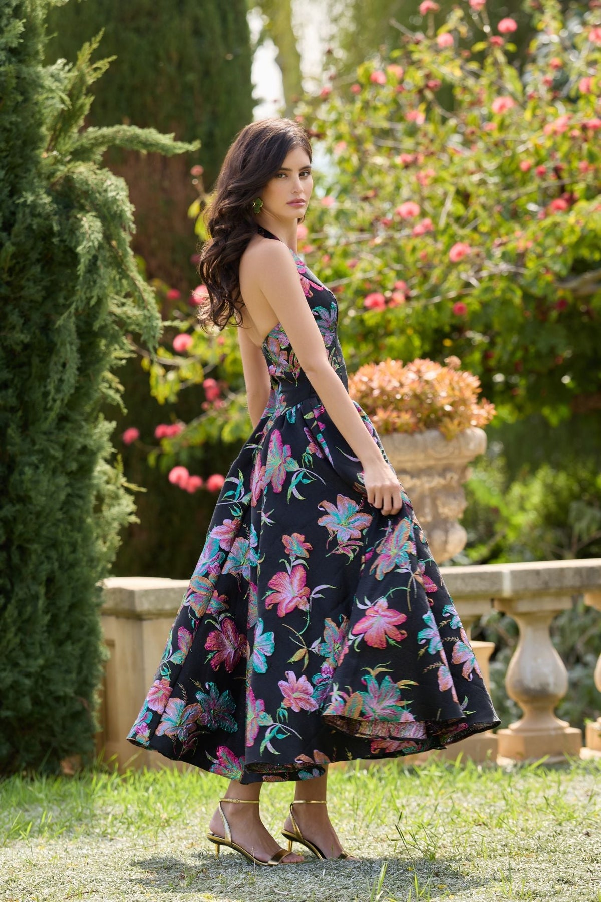 Side-view-of-A-line-black-multi-formal-gown-with-shimmer-texture