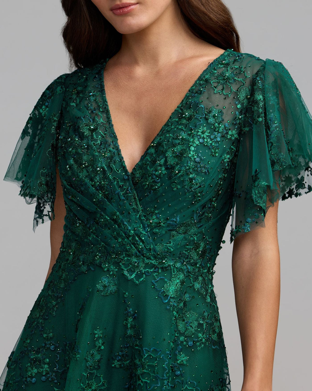 Close up view of the Mac Duggal Emerald Green Embroidered Flutter Sleeve A-Line Dress #20486 