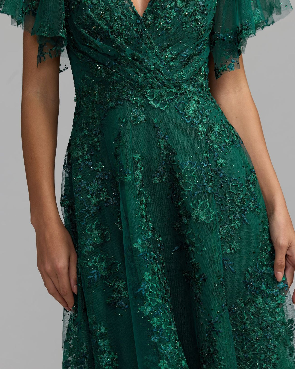 Mac Duggal torso shot of model in Emerald Green Embroidered Flutter Sleeve A-Line Dress #20486 