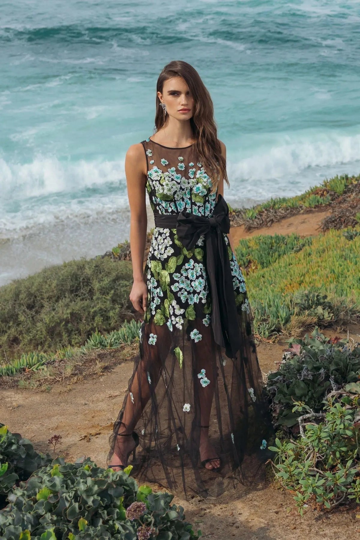 Editorial image of model in Mac Duggal Black Floral Embroidered Corset Gown With Bow #21058 Blue Multi