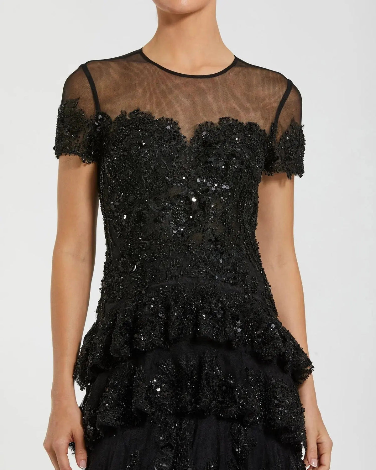 Back-view-of-tiered-ruffle-mesh-gown-in-black-with-concealed-zipper