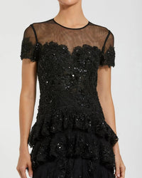 Back-view-of-tiered-ruffle-mesh-gown-in-black-with-concealed-zipper