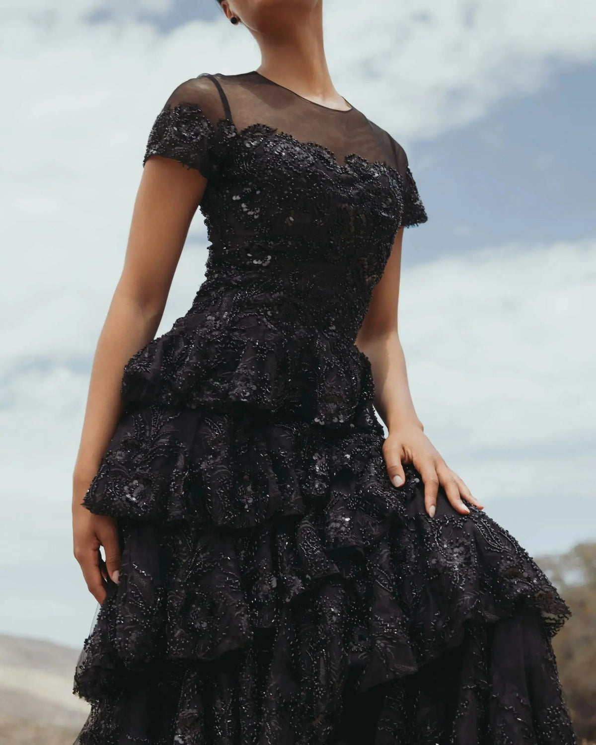 Close-up-profile-view-of-sheer-black-illusion-cap-sleeve-and-sweetheart-underlay