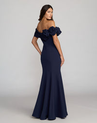 Side view of model wearing Navy Off The Shoulder Rosette Crepe Mermaid Gown
