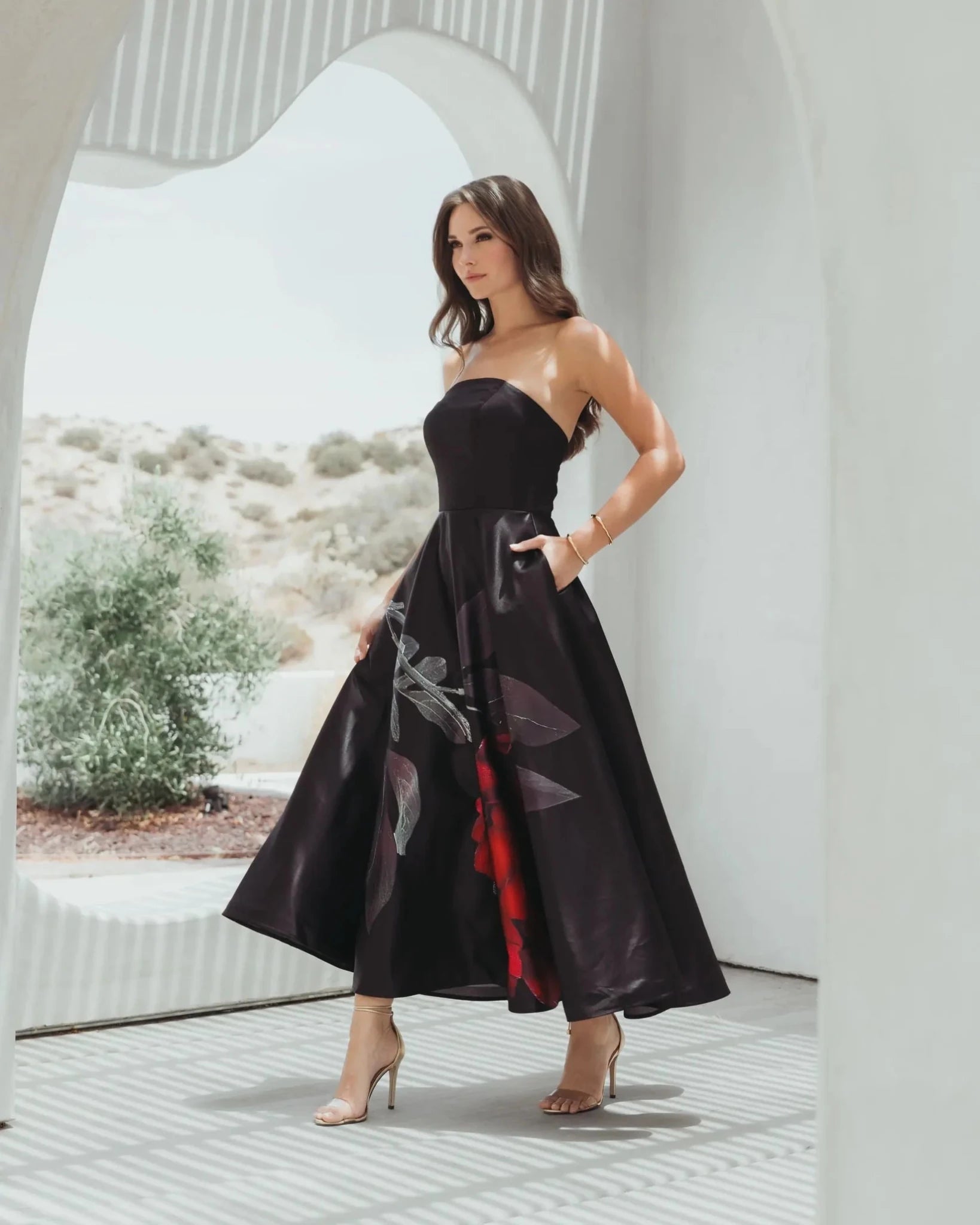 Mac Duggal #21152 Black Printed Satin Strapless Midi Dress Pockets lifestyle shot