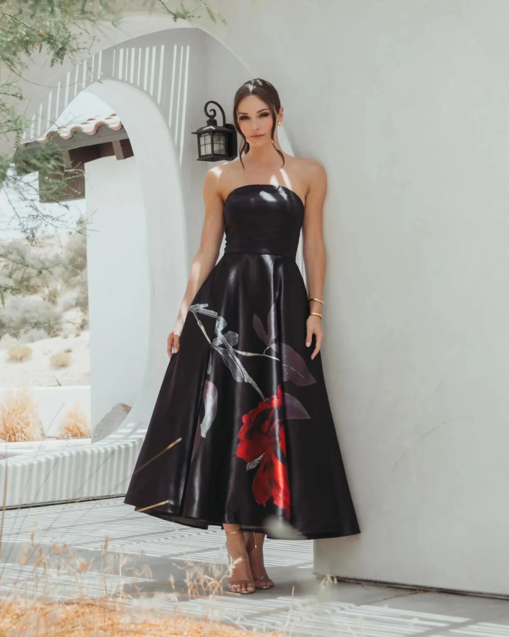 Mac Duggal #21152 Black Printed Satin Strapless Midi Dress Pockets lifestyle shot front