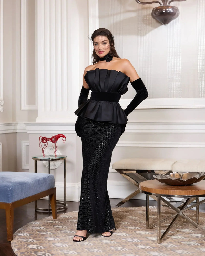 Black belted strapless satin peplum sequin column gown