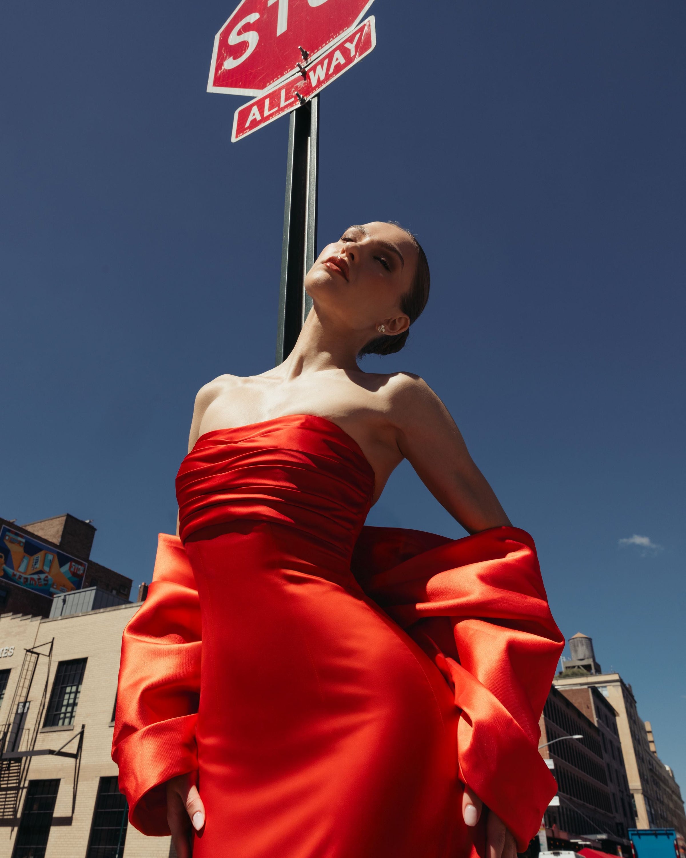 Mac Duggal #21192 ruby satin column gown alternate lifestyle shot