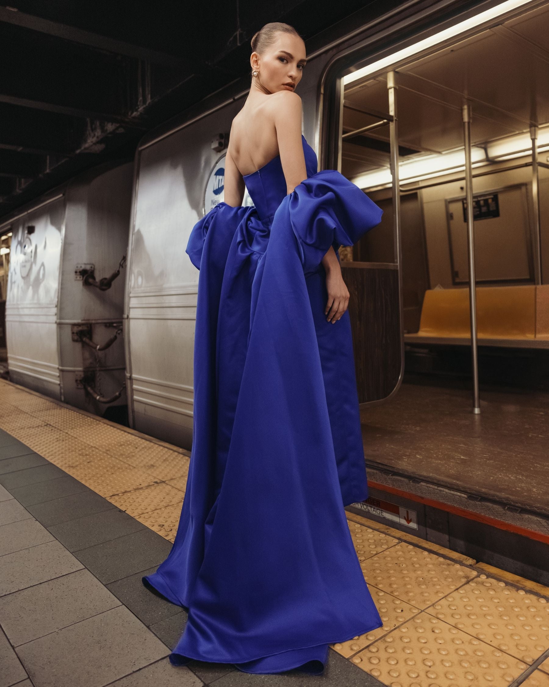 Mac Duggal 21239 Cobalt strapless puff sleeve satin gown with cape - back view