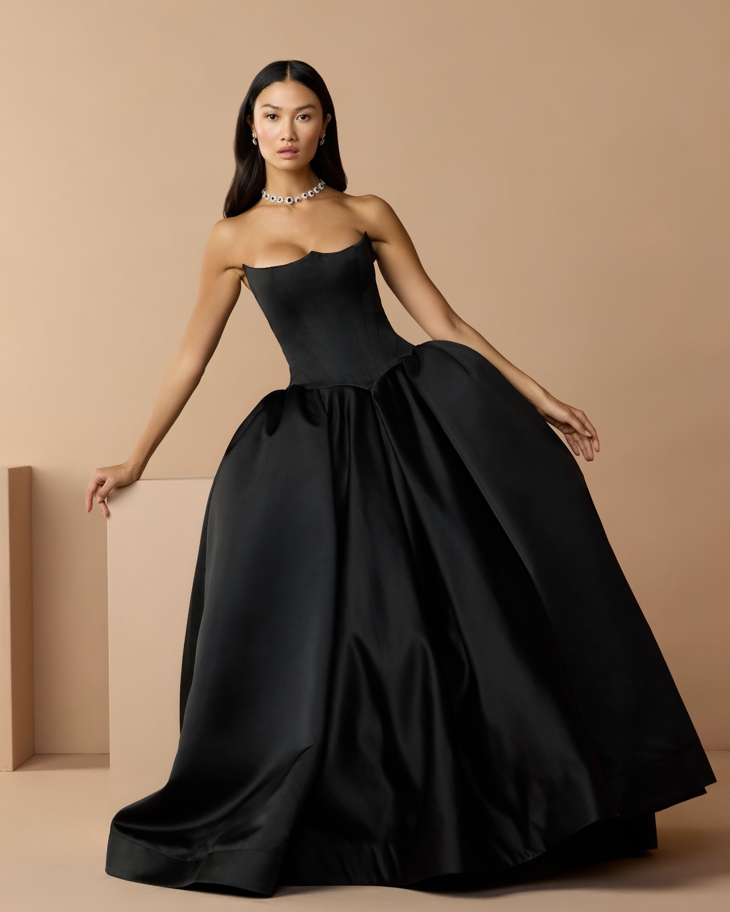 Mac Duggal #21259 black satin ball gown lifestyle shot
