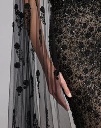 Mac Duggal #21269 black embellished lace one shoulder gown with cape sleeve close-up