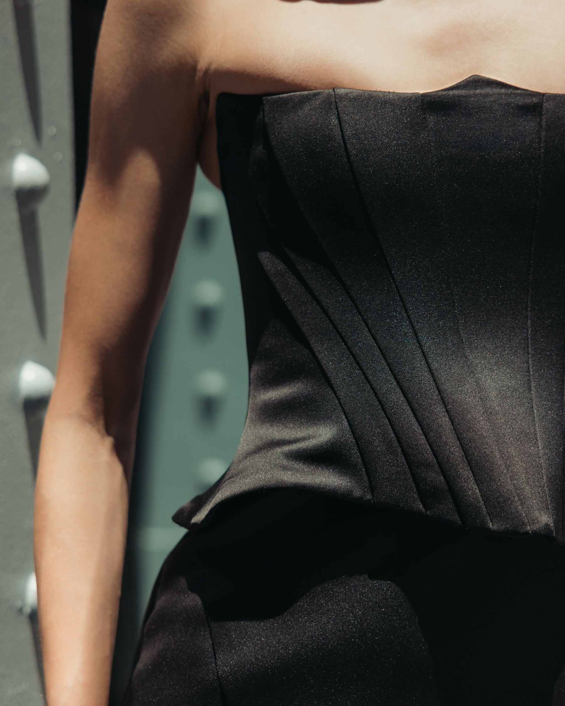 Mac Duggal #21270 black satin gown seam detail close-up