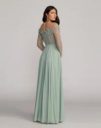 side view of model wearing Mac Duggal Style 21315 Sage green tulle gown with floral appliqué and A-line silhouette