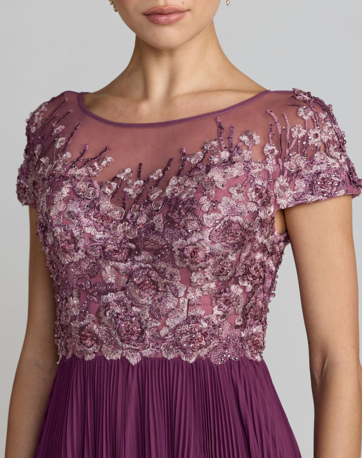 Mac Duggal #21334 plum embroidered cap sleeve pleated gown close-up