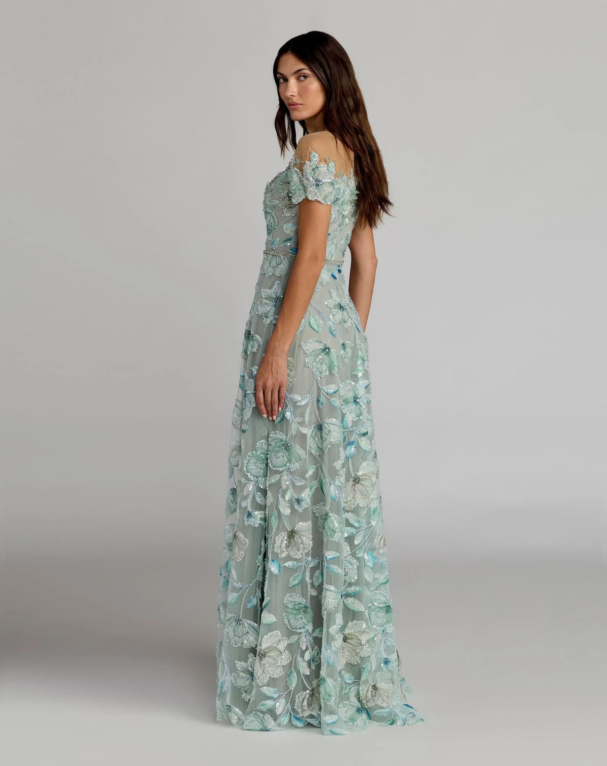 side view of Mac Duggal Style 21339 Sage Multi high neck gown with intricate floral embroidery and beaded embellishments.