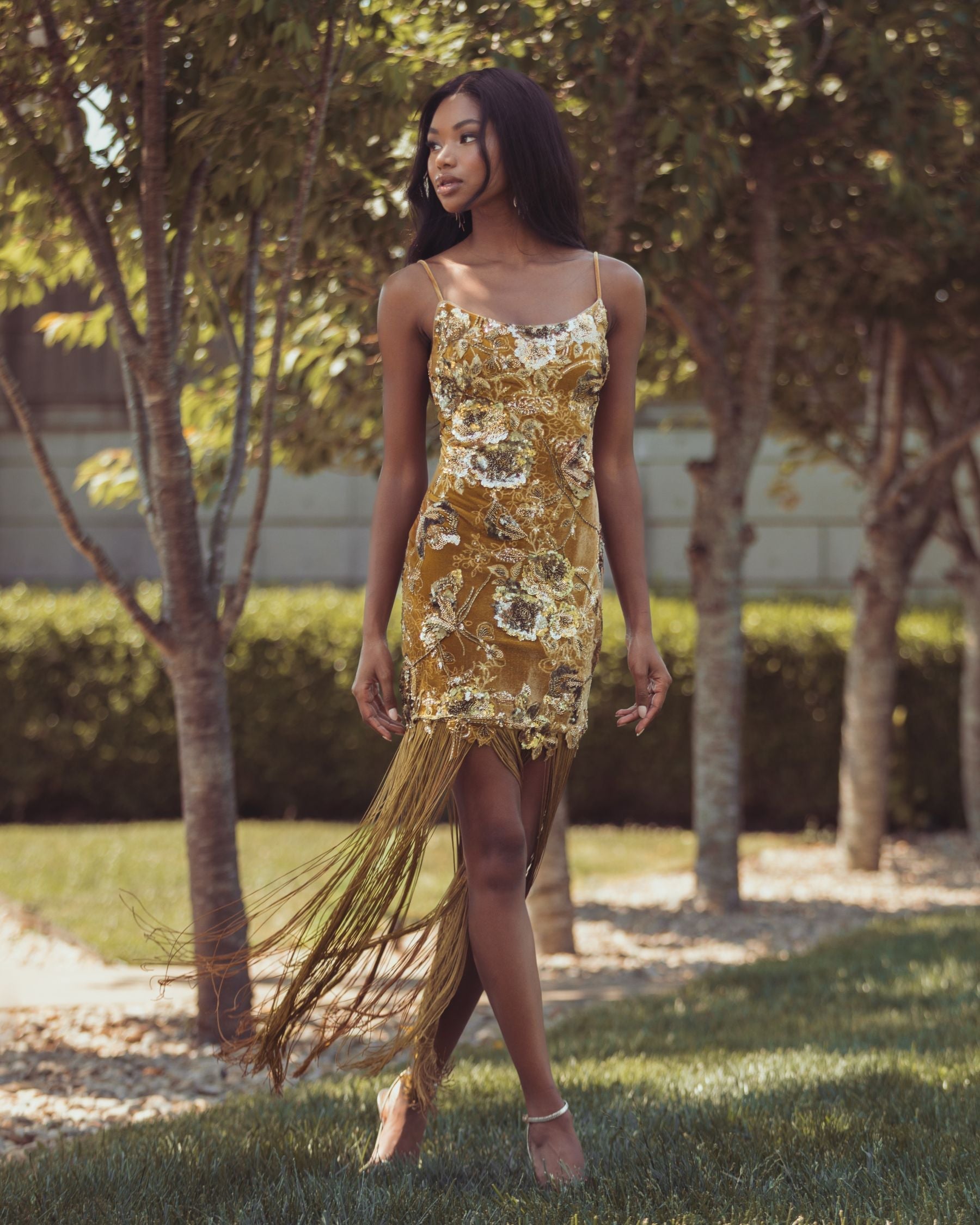 Mac Duggal #21486 gold fringe gown lifestyle shot