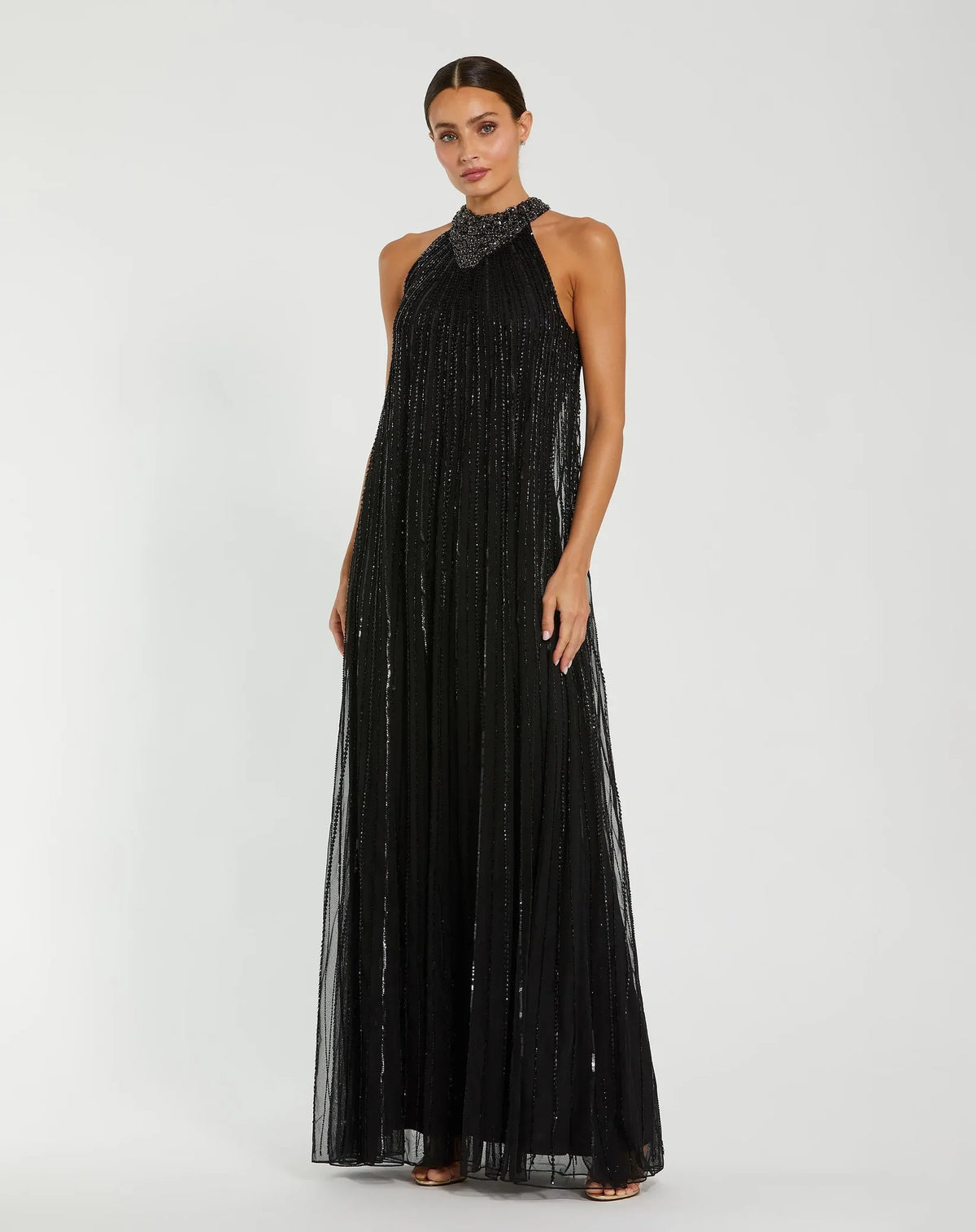 Black sleeveless halter neck embellished trapeze gown