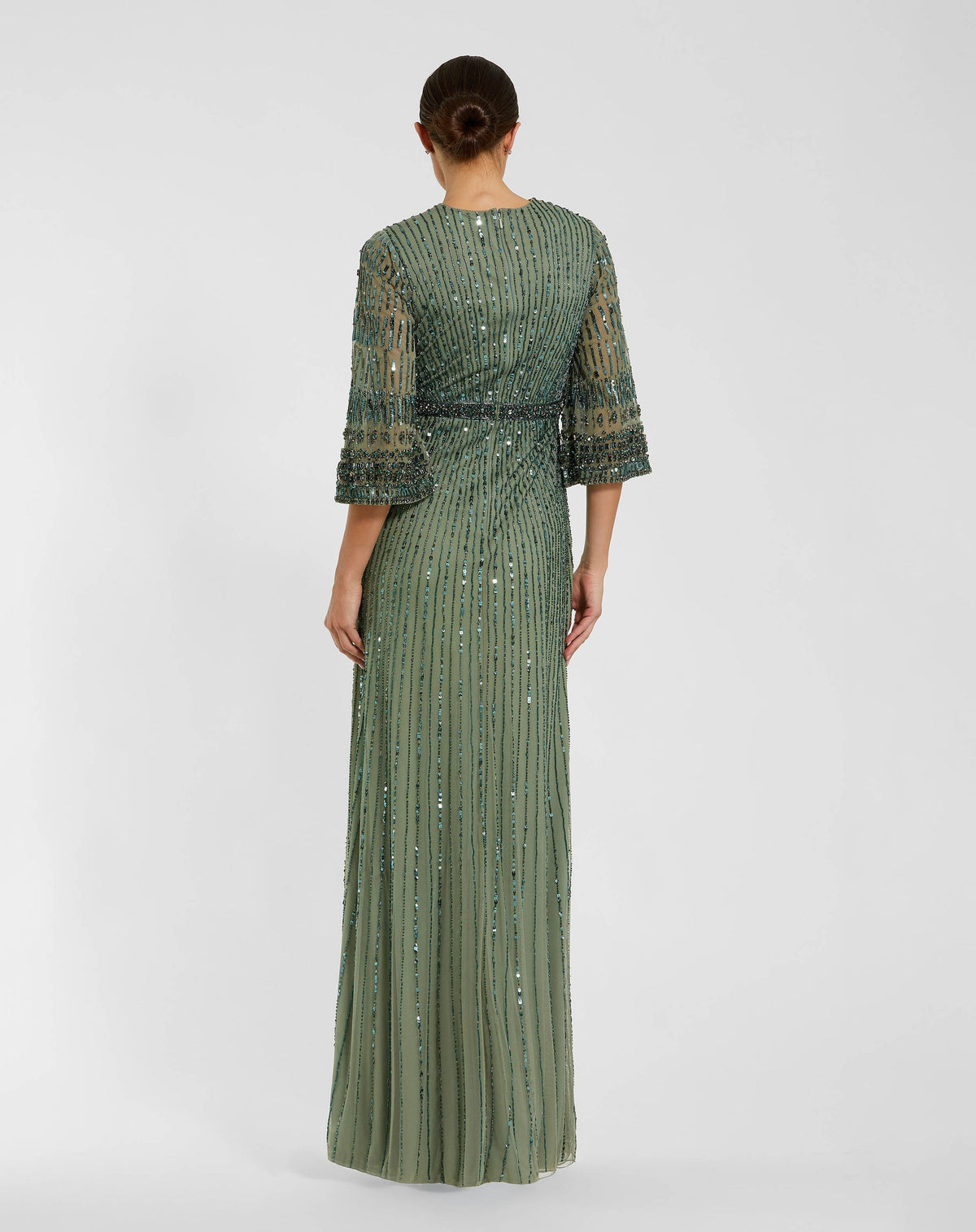 back of model wearing Studio shot of model in Mac Duggal Green High Neck Embellished Gown With 3/4 Sleeves #23045 Seafoam Green 