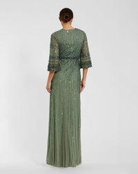 back of model wearing Studio shot of model in Mac Duggal Green High Neck Embellished Gown With 3/4 Sleeves #23045 Seafoam Green 