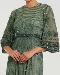 close up studio shot of model wearing the Studio shot of model in Mac Duggal Green High Neck Embellished Gown With 3/4 Sleeves #23045 Seafoam Green 