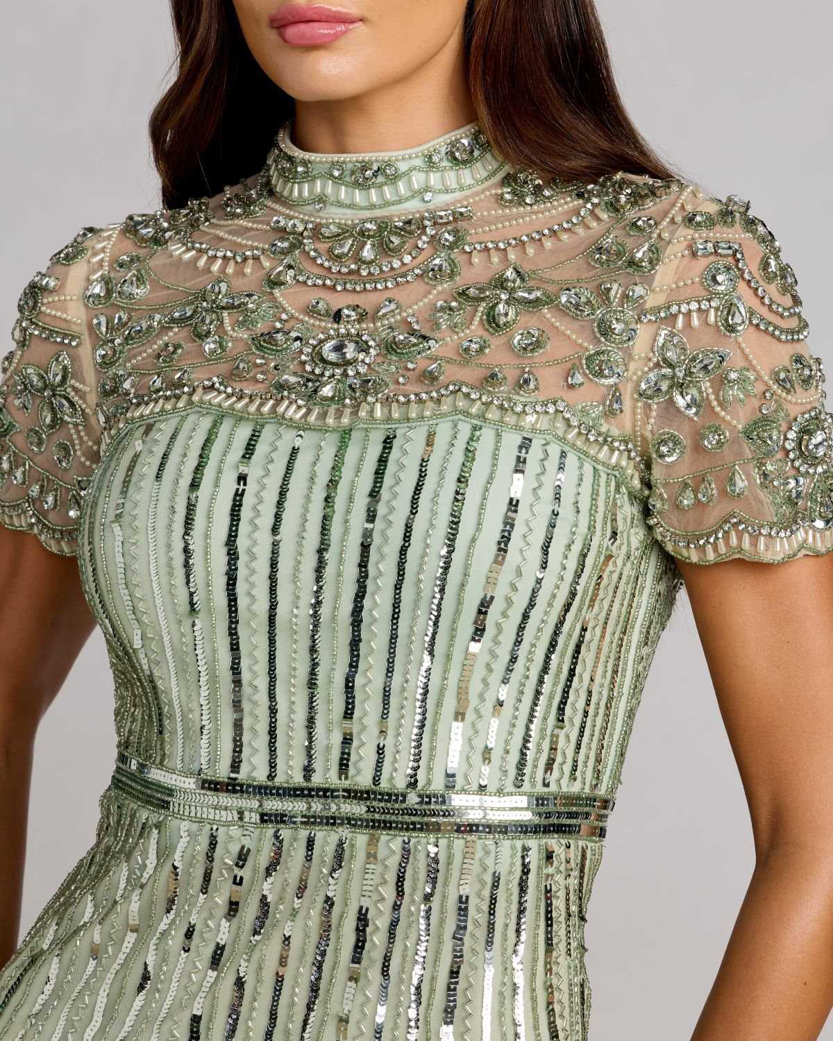 Close-up of high illusion mock neck with intricate beadwork, pearls, and rhinestones on Mac Duggal 23075 dress