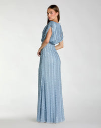 back view of model wearing Mac Duggal Blue Embellished Blouson V Neck Column Gown #23081