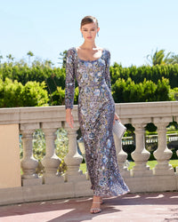 Model shot in Mac Duggal Blue Floral Sequin Long Sleeve Gown #23103 Hydrangea Multi