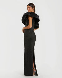 Black evening gown with puff sleeves on a white background