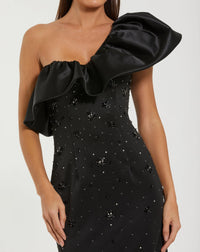 Black one-shoulder dress with ruffled detail on a white background