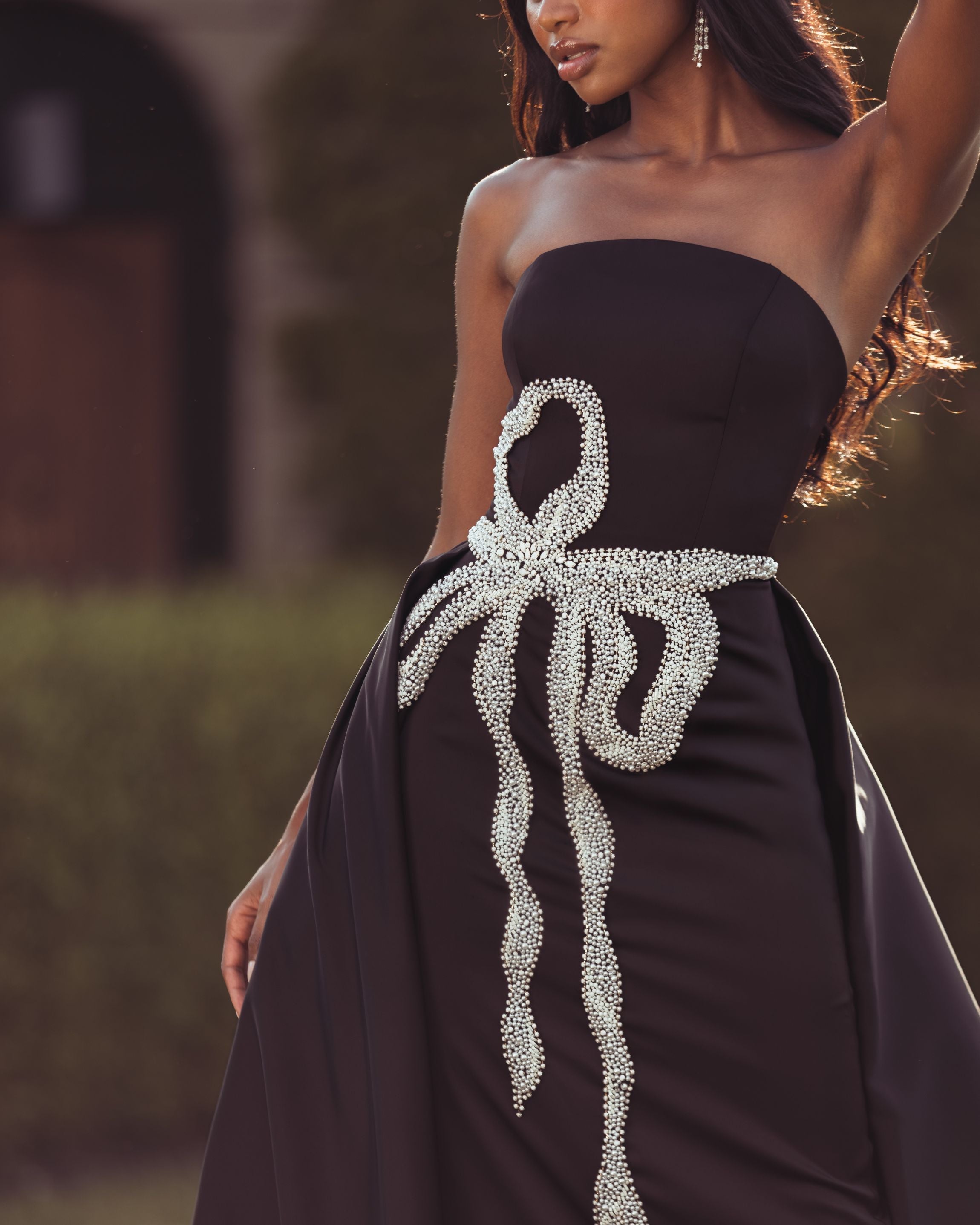 Mac Duggal #2317 black white satin gown beaded bow lifestyle zoom