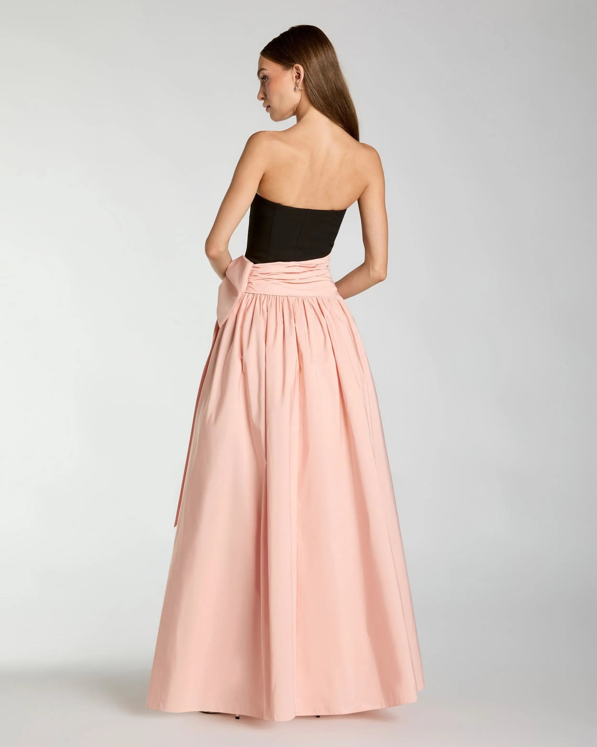 Black Pink Strapless Gown With Oversized Bow - Back