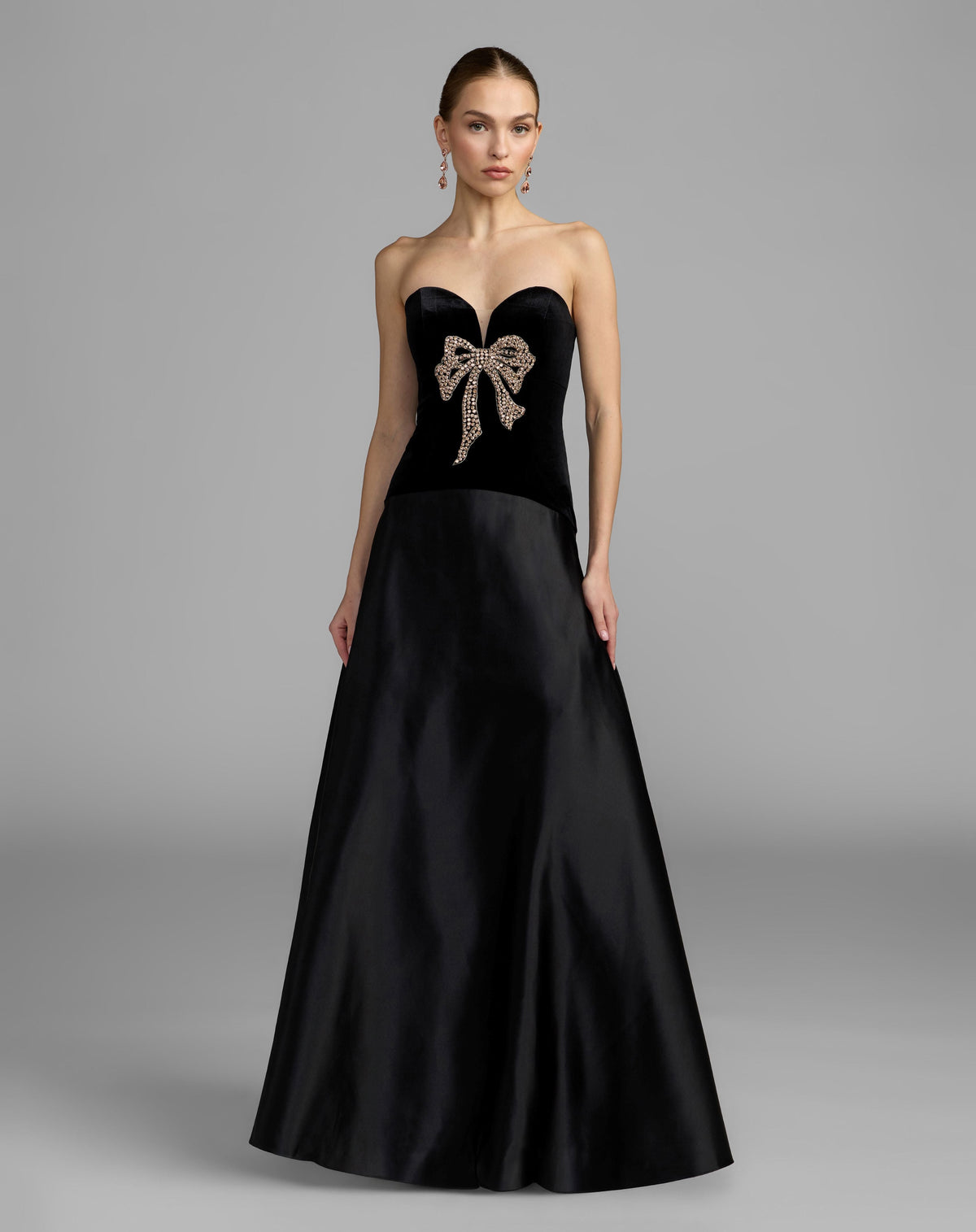 Mac Duggal #2423 black gold strapless velvet gown with bow detail