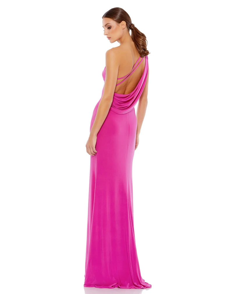 This playful Mac Duggal hot candy pink, floor-length, bodycon jersey, evening dress is a beautiful, simple and sleek, off-the-shoulder evening gown with a sexy open cowl back and a thigh-high slit. This gown is perfect for proms, black-tie affairs, weddings and special events back view