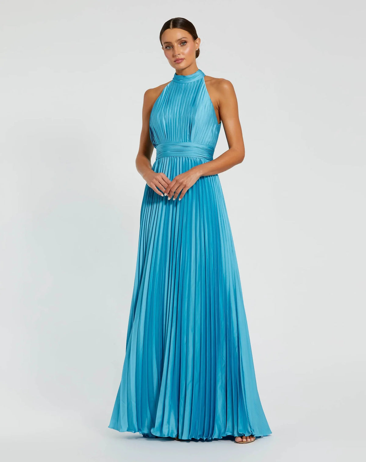 Model wearing style number 26992 high neck satin gown in pool blue