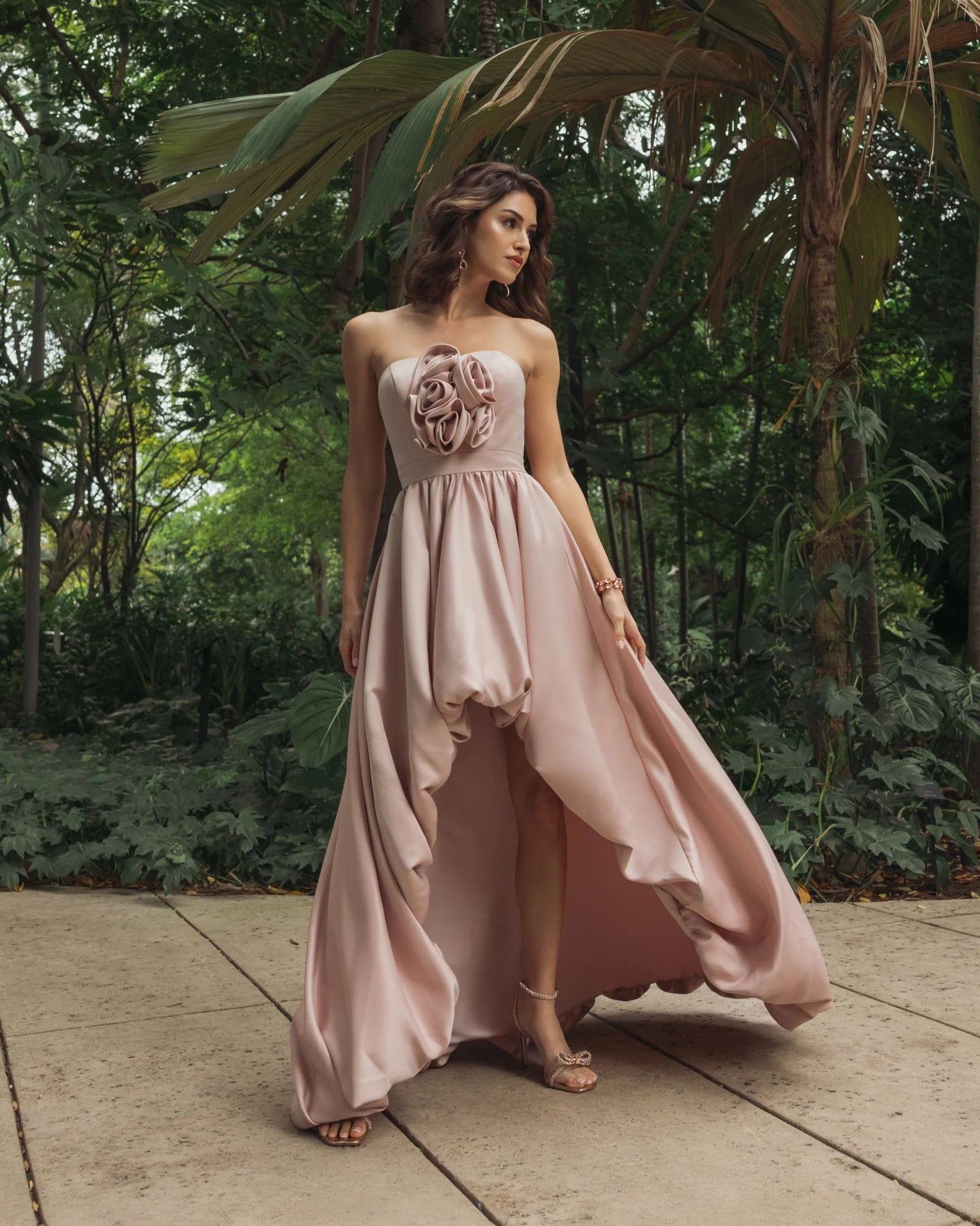 Blush strapless satin high-low gown with rosette